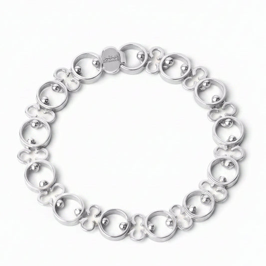 Silver bracelet on a white background